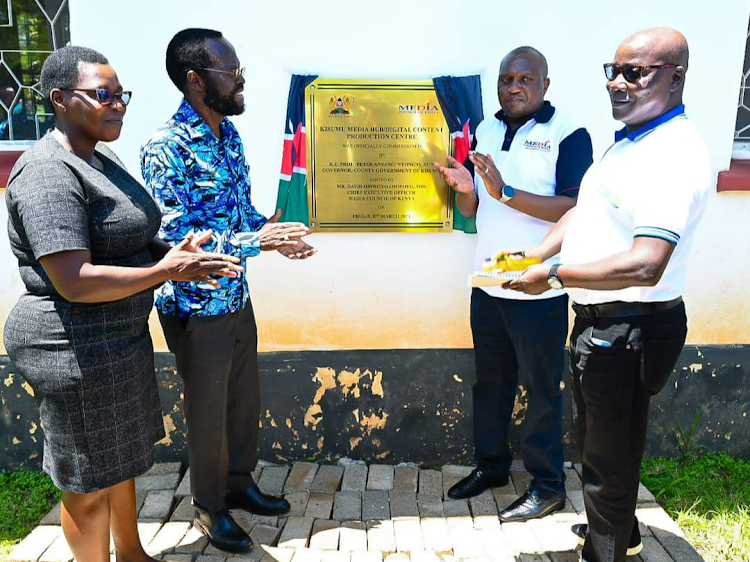 Kisumu Governor Anyang' Nyong'o and Media Council of Kenya CEO David Omwoyo accompanied by Kisumu Journalists Network officials during the launch of the Kisumu Media Hubbs and the Digital Content Production Centre, Friday, March 8, 2024.,