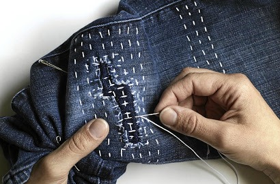 Don't hide the darned patches on your old clothes, show them off — it's all the rage!