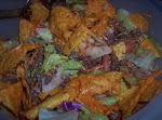 Paula Deen's Taco Salad was pinched from <a href="http://www.food.com/recipe/paula-deens-taco-salad-141195" target="_blank">www.food.com.</a>