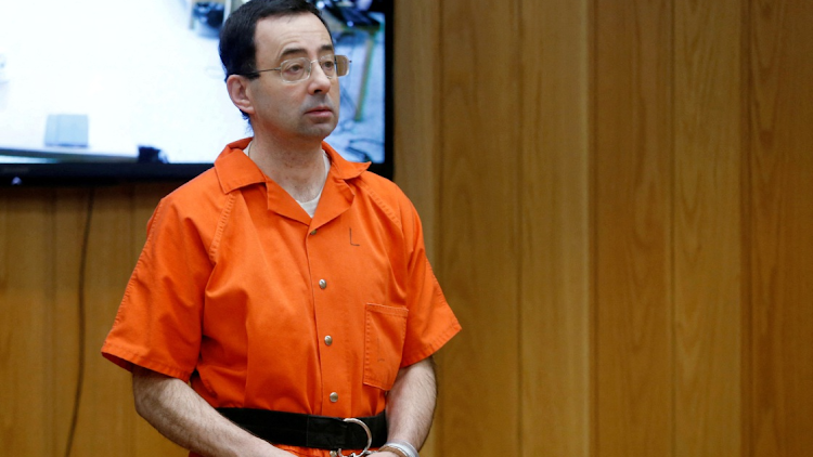 Larry Nassar, a former team USA Gymnastics doctor who pleaded guilty in November 2017 to sexual assault charges, stands in court during his sentencing hearing in the Eaton County Court in Charlotte, Michigan, US, February 5, 2018.