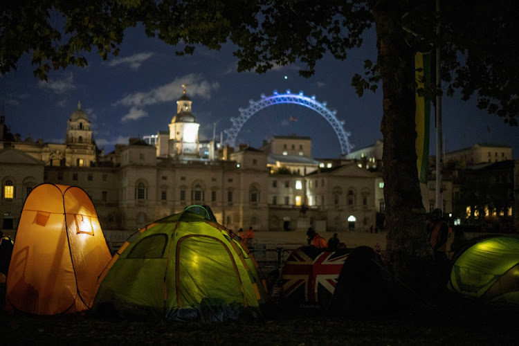 People camp out a day before the funeral of Britain's Queen Elizabeth, following her death, in London, Britain, on September 18. Picture: REUTERS/MARKO DJURICA