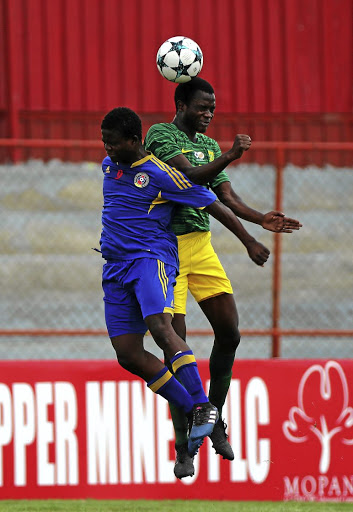 Givemore Khupe, right, of South Africa says their goal is to play in the World Cup in May. /BackpagePix / Chris Ricco