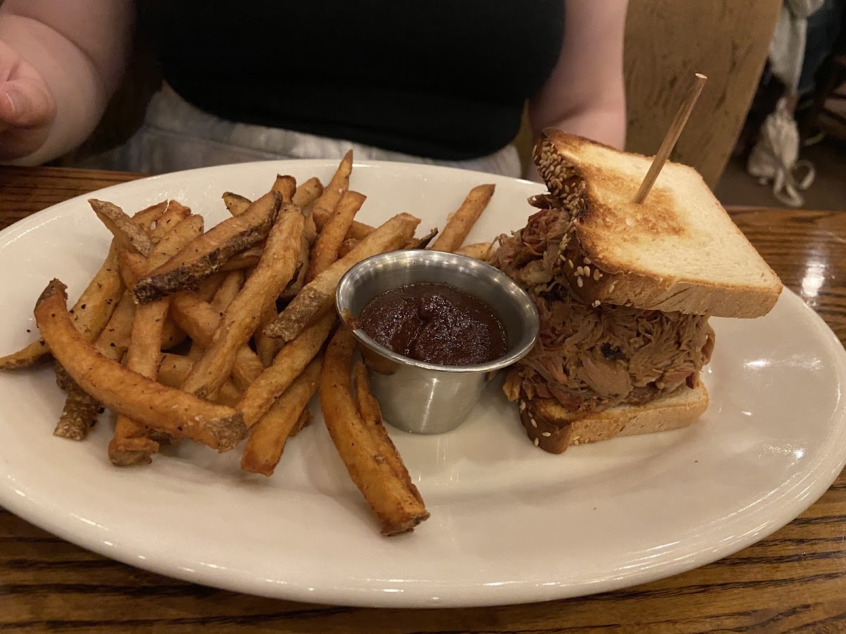 GF Pulled pork sandwich with fries.