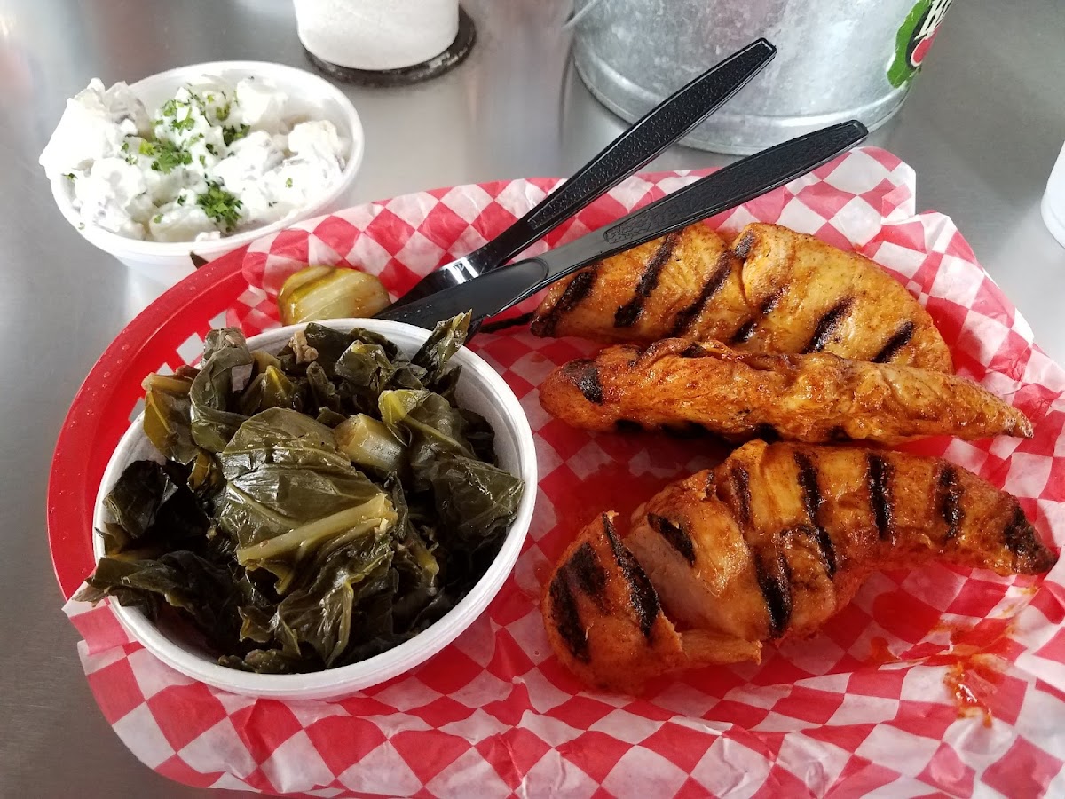 Gluten free tenders with greens and potato sslad.