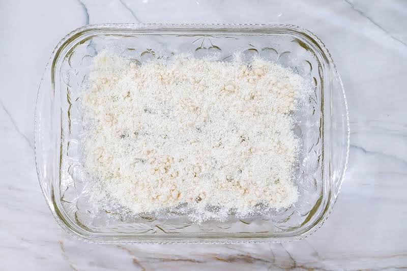 Sprinkle Some Of The Crumb Mixture Into A Greased Pan.