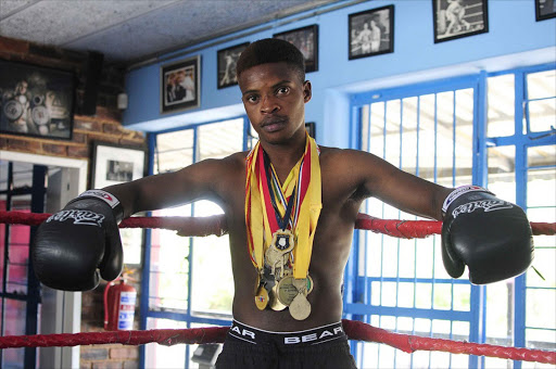 Decorated top amatuer Percy Mkhize at the Hotbox gym. Mkhize makes his professional debut in Soweto on Saturday. Photo Thulani Mbele. 09/10/2014
