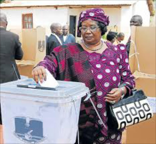 Incumbent President Joyce Banda votes during the Malawian presidential election, in Malemia