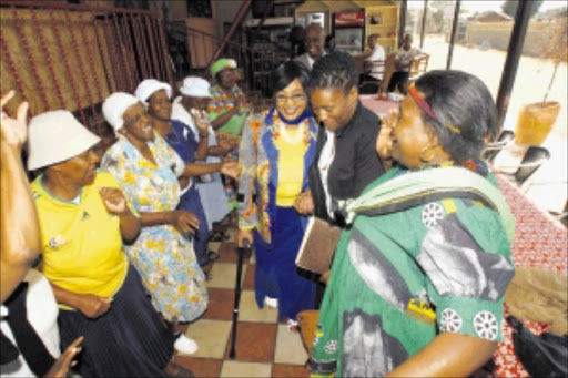 HONOURED: Winnie Madikizela-Mandela celebrated a double in Soweto yesterday - being awarded the National Heritage Council Ubuntu Award and celebrating her 75th birthday. PHOTO:VELI NHLAPO