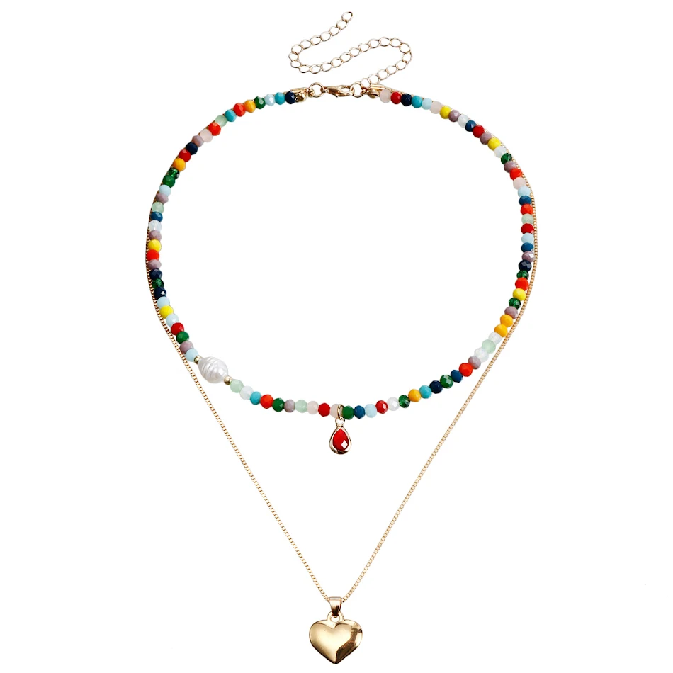 Collier bohème multicouche avec perles en forme de riz et couleurs contrastées, un accessoire tendance pour un style décontracté et élégant.