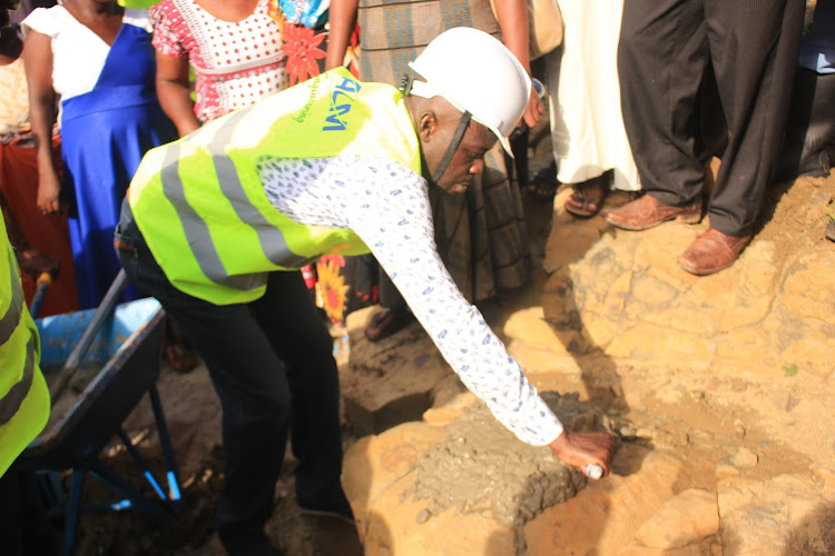 Kilifi South MP Ken Chonga laying the foundation stone to the construction of Mto mkuu Bridge on Monday 7th October