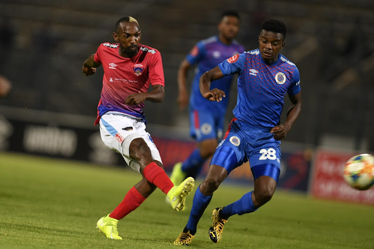 FIERCE TUSSLE: Thabo Rakhale, of Chippa United, and Tebogo Mokoena, of SuperSport United, vie for possession during their Absa Premiership match at the Lucas Moripe Stadium in Pretoria on Friday