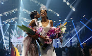 Miss World South Africa, Thulisa Keyisa kisses Tamaryn Green who was crowned Miss SA 2018 during the jubilee edition of the pageant held at Times Square in Pretoria.