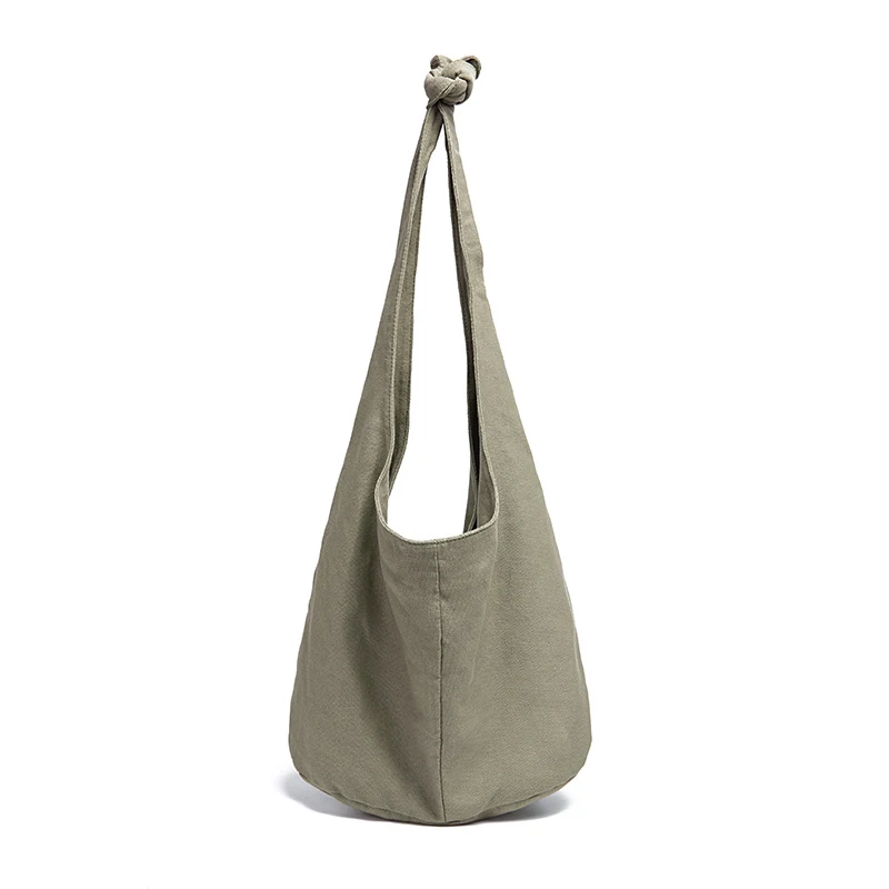 Sac à main femme une épaule en coton lin toile jacquard. Élégant et pratique, parfait pour transporter vos essentiels avec style et confort au quotidien.