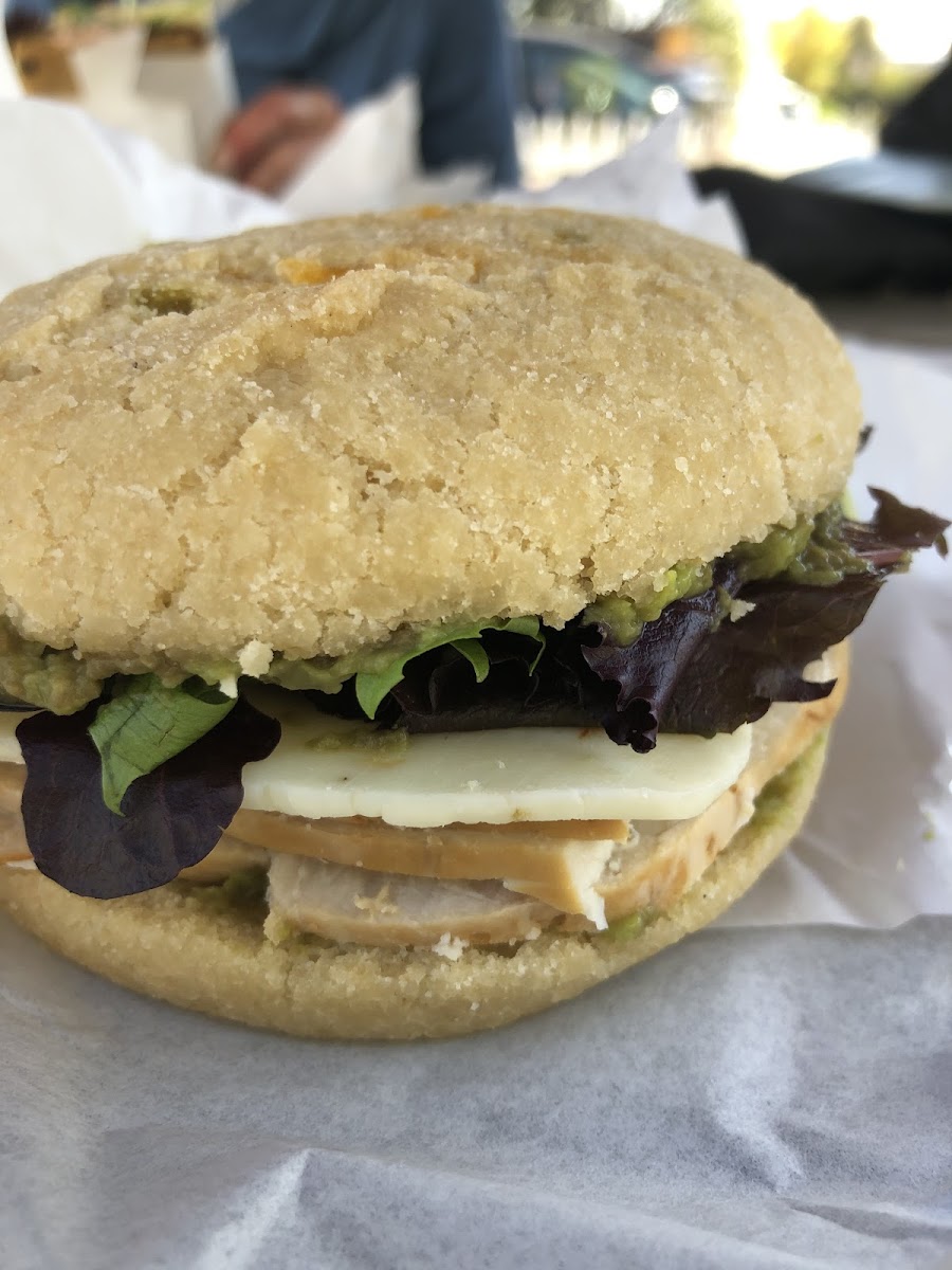 Spicy Turkey sandwich with avocado spread on jalapeño cheddar bread.