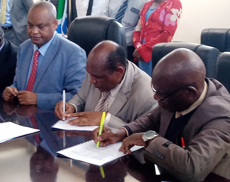 Moi Referral Hospital CEO Dr Wilson Aruasa leads officials during the signing of CBA with Kudheiha on September 23, 2022