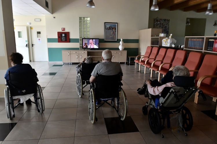 Guests of a nursing home watch television, as the spread of the coronavirus disease continues in Capralba, Italy, on May 22 2020. Picture: REUTERS/FLAVIO LO SCALZO