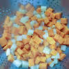 Thumbnail For Draining Cooked Sweet Potatoes And White Potatoes.