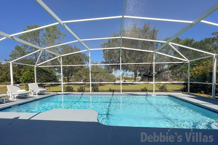 Sun-drenched private pool deck with no overlooking neighbours at this Davenport vacation villa