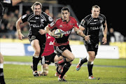 MAN WITH A PLAN: Dan Carter of the Crusaders makes a break during the Super Rugby semifinal match between the Crusaders and the Sharks at AMI Stadium in Christchurch on Saturday Photo: Martin Hunter/Getty Images