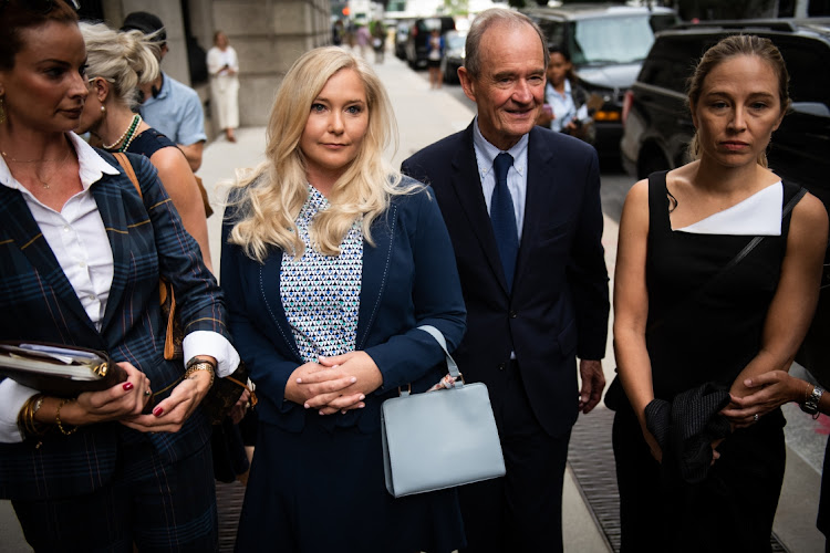 David Boies, representing several of Jeffrey Epstein's alleged victims, center, arrives with Annie Farmer, right, and Virginia Giuffre, alleged victims of Jeffrey Epstein, second left, at federal court in New York, U.S. in August 2019.