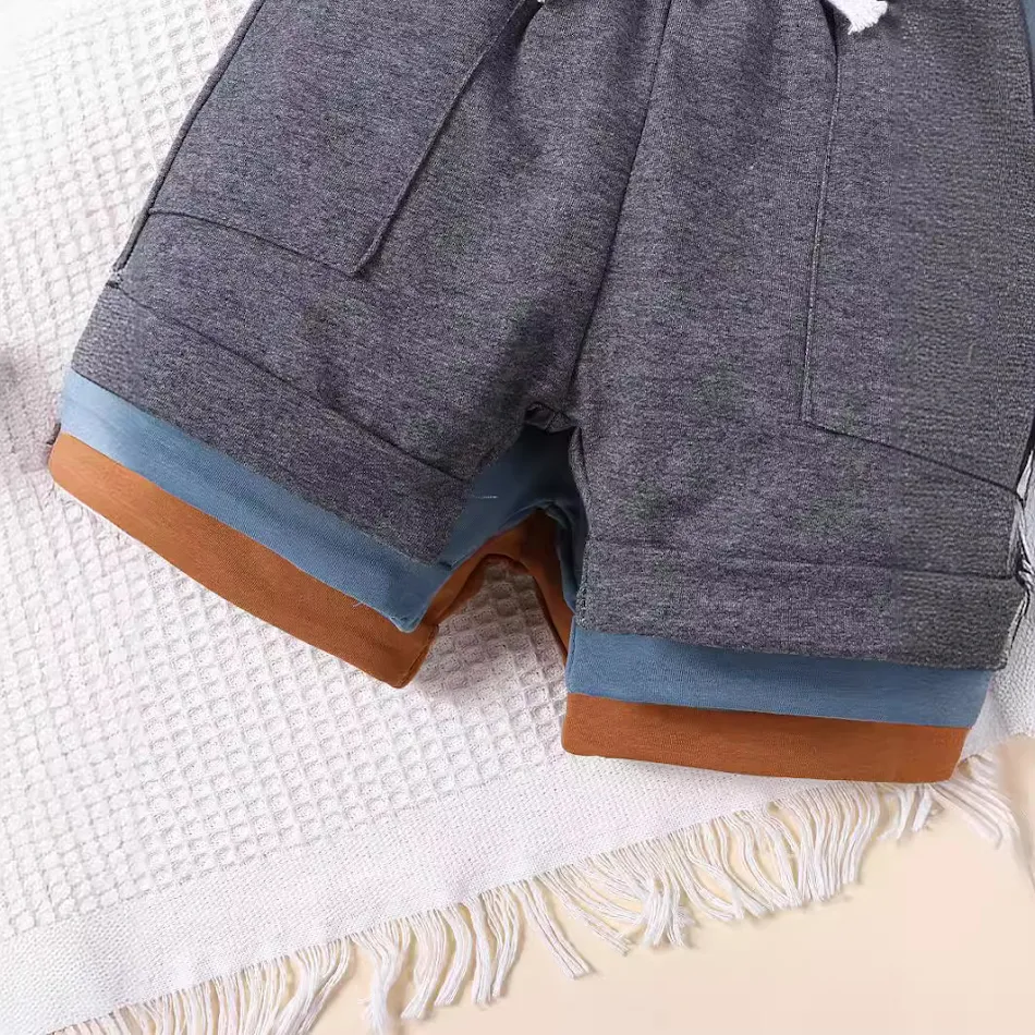 Outdoor sportieve casual shorts voor meisjes en jongens. Comfortabele en functionele shorts voor sport en spel, ideaal voor buiten.
