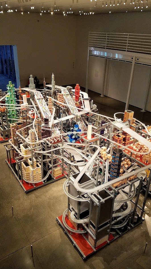 If you buy your LACMA museum admission, there is another Chris Burden exhibit you can view inside one of the building Broad Contemporary Art Museum. This is Metropolis II, also a sculpture but a kinetic one. Some of the times, it is a mini city, frozen in time with a lot of Hot Wheel Cars and Miniature trains on bridges and roads throughout the multiple levels.