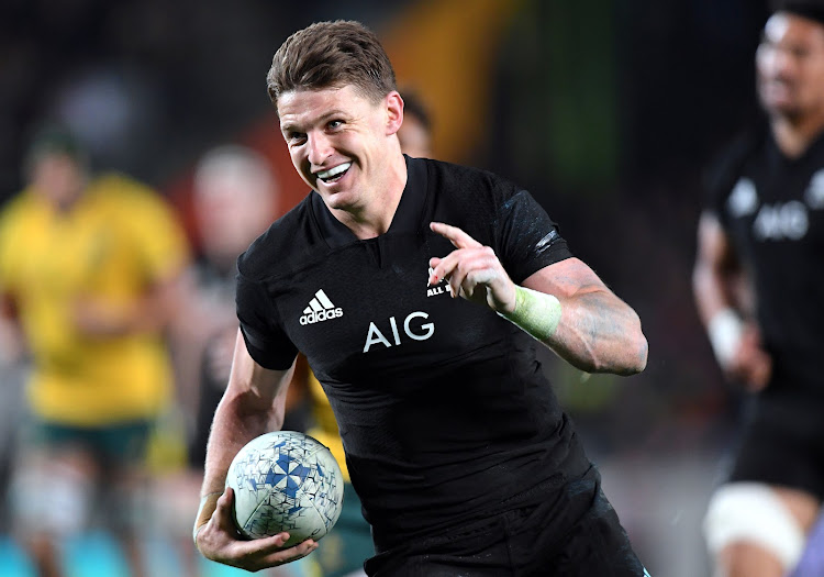 New Zealand's Beauden Barrett scores one of his four tries during the Bledisloe Cup match against Australia at Eden Park, Auckland, New Zealand on August 25, 2018.