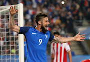 France's Olivier Giroud celebrates scoring their third goal to complete his hat-trick against Paraguay in an International friendly at Roazhon Park in Rennes, France on 2 June 2017.