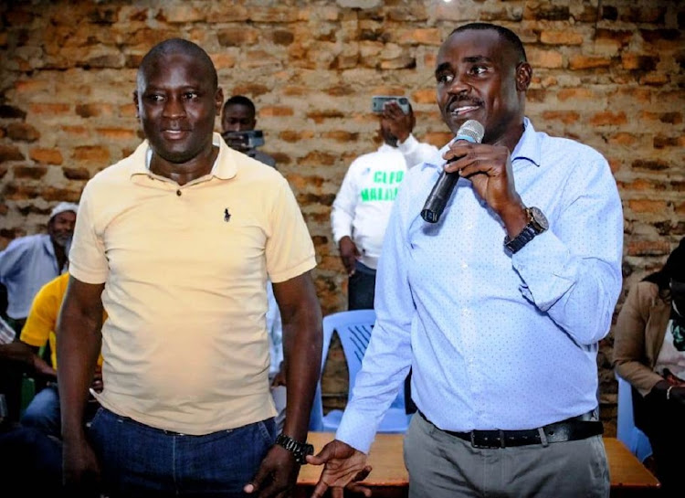 Kakamega ANC governor aspirant Cleophas Malala (R) with Butere parliamentary UDA aspirant Michael Keya at Sabatia on Friday