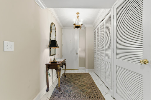 hallway with rug and closets - Buy this luxury apartment / penthouse in Nashville, 2 bedrooms