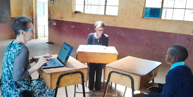 University of Melbourne in Australia Professor Esther Care with another assessor and learner during the piloting of CBC assessment tools at Kamahindu school in Kiambu on February 26, 2024.