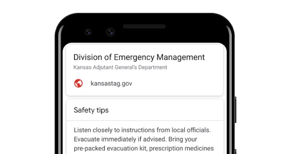 A mobile phone displays safety tips from Kansas’ Division of Emergency Management and from the American Red Cross, followed by Google Search results related to floods in Kansas.