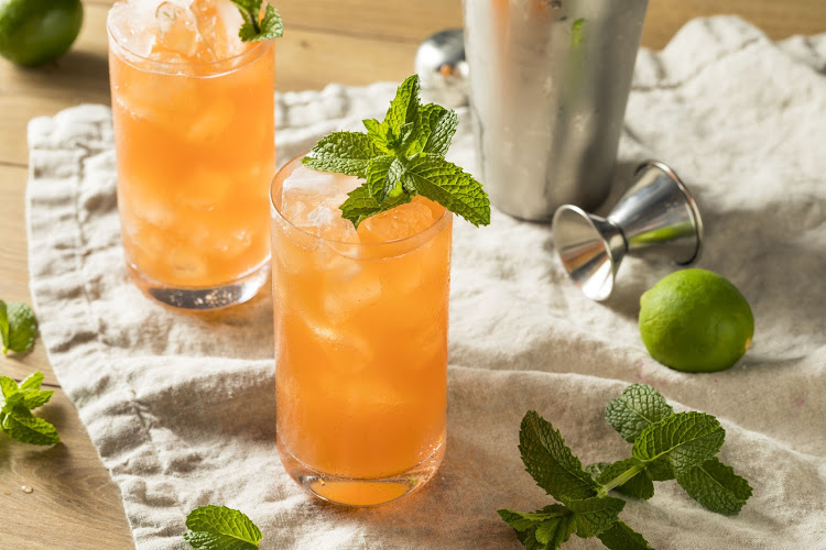 A sweet tropical zombie cocktail with rum and mint. Picture: 123RF/BRENT HOFACKER