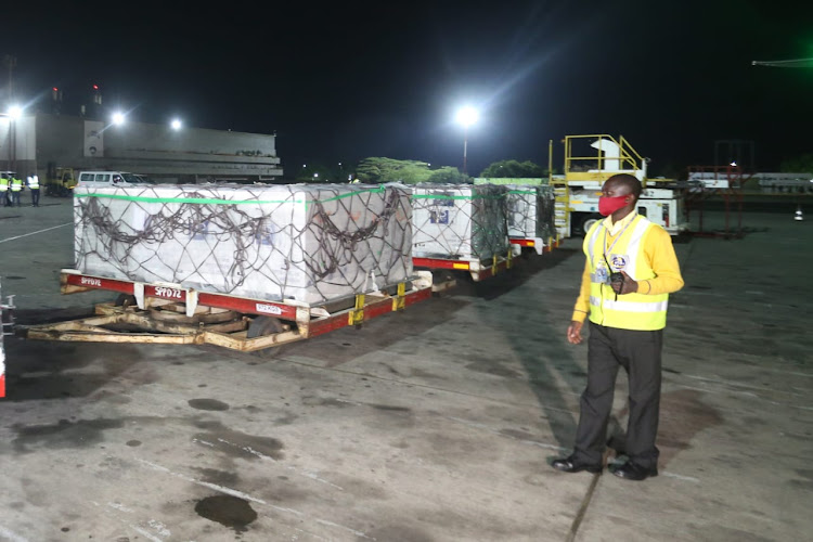 Vaccines being offloaded from a plane at the JKIA/