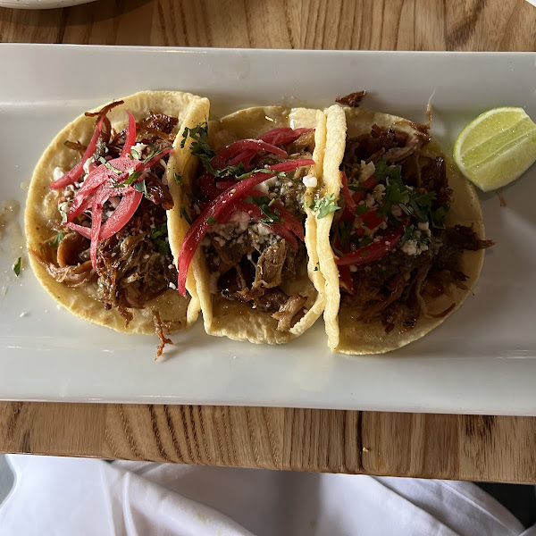 Crispy carnitas tacos. Made to order corn tortillas are so perfect!