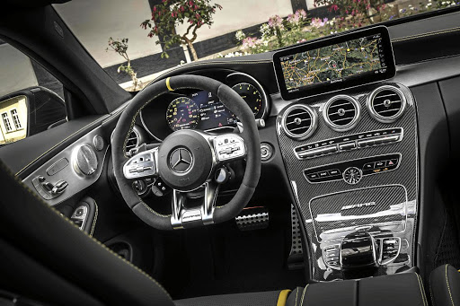 The interior gets the full AMG treatment but look closely and you will see a new dial on the steering wheel