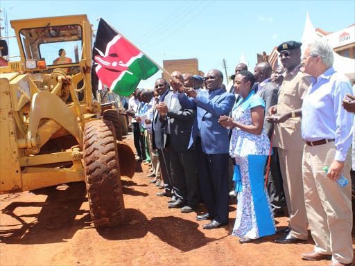 Transport Cabinet Secretary James Macharia commissioning the Mugeka Thuita Kiria-ini Gitugi Chui road at Kiria-ini town on Monday.