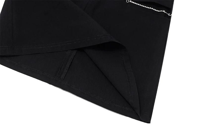 Damska spódnica z patchworku, do połowy długości, o kroju kopertowym, podkreślająca biodra. Idealna na codzienne i eleganckie wyjścia.