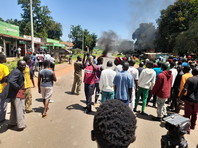 Residents demonstrate in protest against the police after the Form One student was killed.