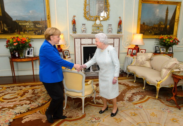 Queen Elizabeth meets former German Chancellor Angela Merkel at Buckingham Palace. Picture: GETTY IMAGES/DOMINIC LIPINSKI-PA/ANADOLU AGENCY