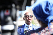 Deputy Minister of Police Bongani Mkhongi speaks to media at the Gauteng School's Safety Summit in Boksburg, Johannesburg. 