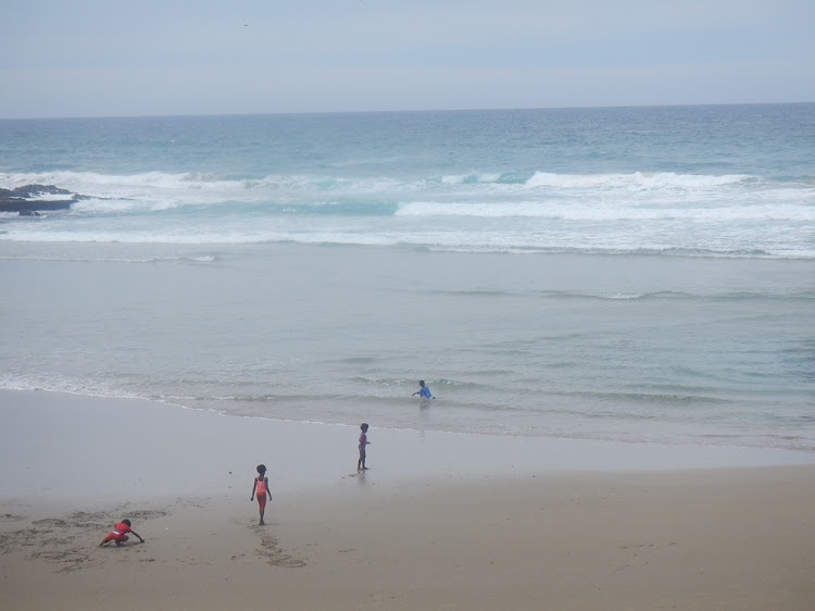 DECEMBER 18;2017: DAREDEVILS: Four young children swimming at the notorious Second Beach in Port St Johns just a day after two beachgoers drowned and two sharks spotted in the waters by authorities.