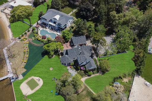 Aerial view, houses and pool - Buy this luxury house in Toms River, 12 rooms, 5 bedrooms