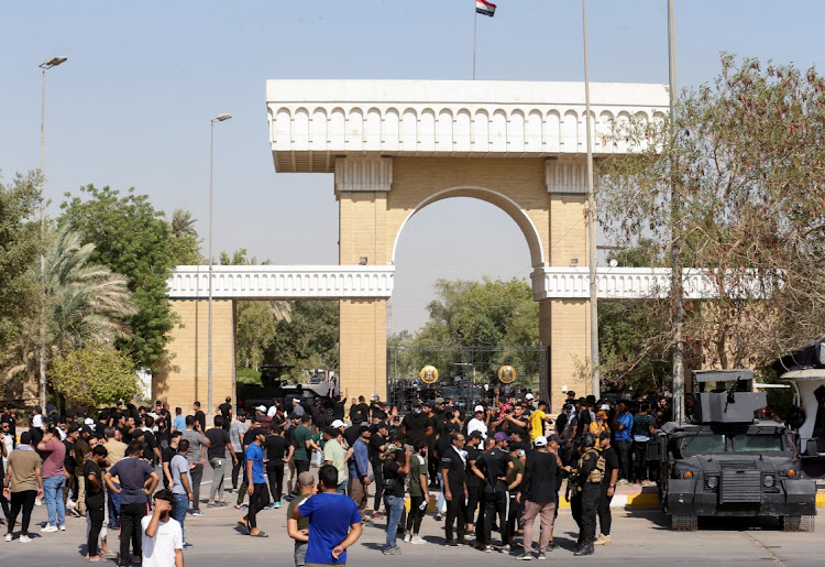 Supporters of Iraqi populist leader Moqtada al-Sadr protest at the Green Zone, in Baghdad, Iraq August 29, 2022.