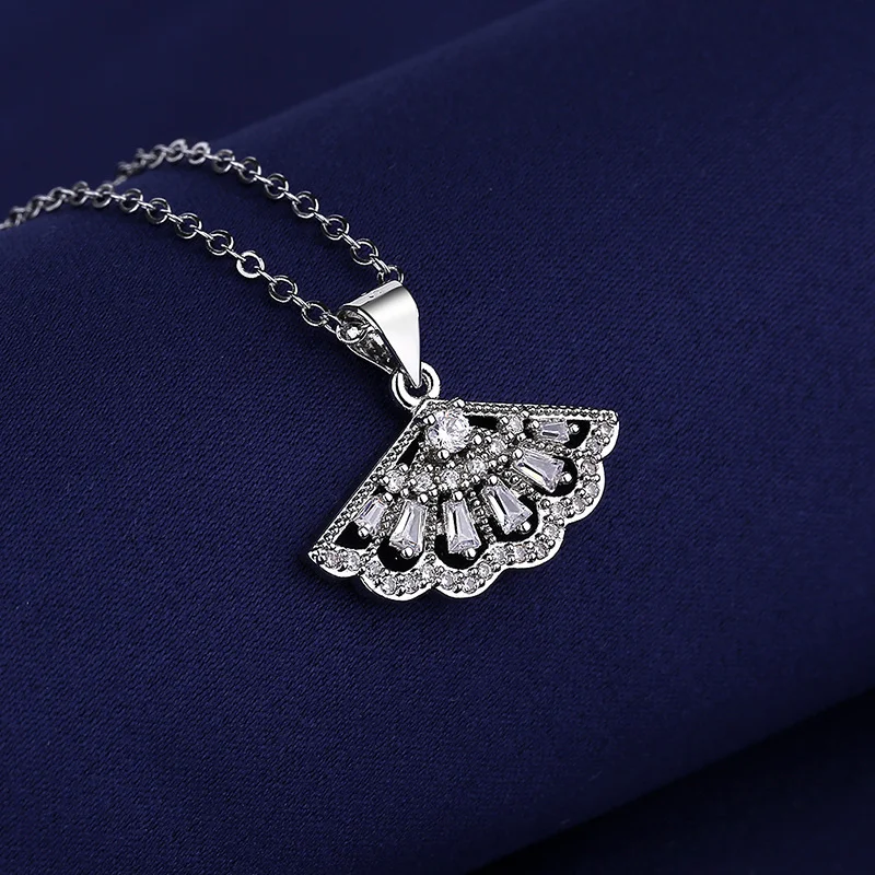Europese en Amerikaanse waaier-vormige mini-rok ketting Ins Hollow, een elegante en modieuze accessoire voor een verfijnde uitstraling.
