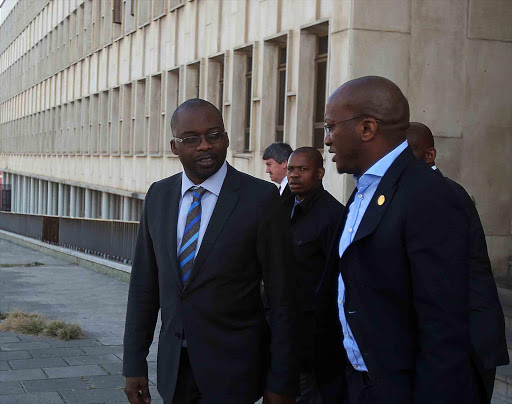 COURT CALL: Justice Minister Michael Masutha, left, during his surprise visit to the East London Magistrate’s Court on Friday Picture: SIBONGILE NGALWA