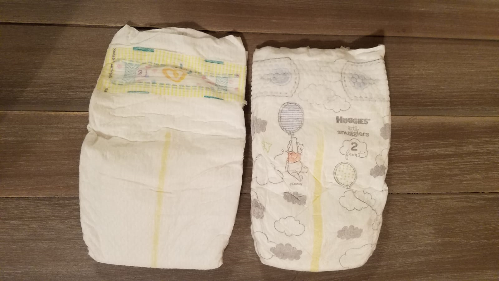 Pampers vs Huggies diapers design