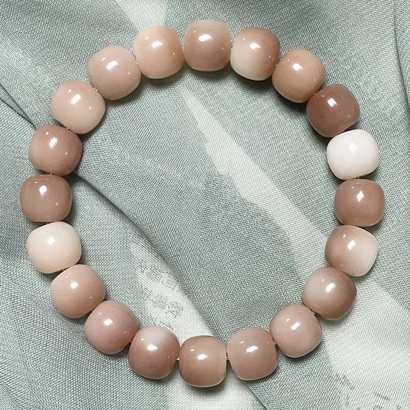 Bracelet violet pour le doigt avec graines de Bodhi naturelles, favorise la méditation, le bien-être et la sérénité.