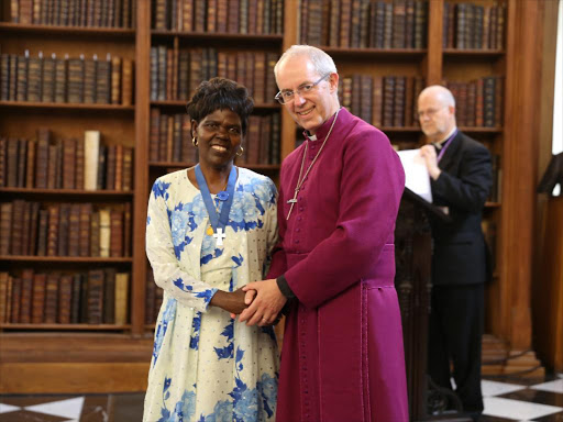 Dr Agnes Abuom receives the Lambeth Cross for Ecumenism from the Archbishop of Canterbury Justin Welby at Lambeth Palace in June / Courtesy