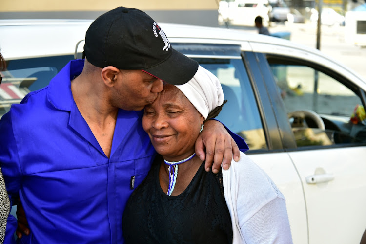 Luyanda Mboniswa was greeted by his mother Sindiswa Mboniswa and other family members outside the correctional centre in Crawford Street in Gqeberha on Wednesday.